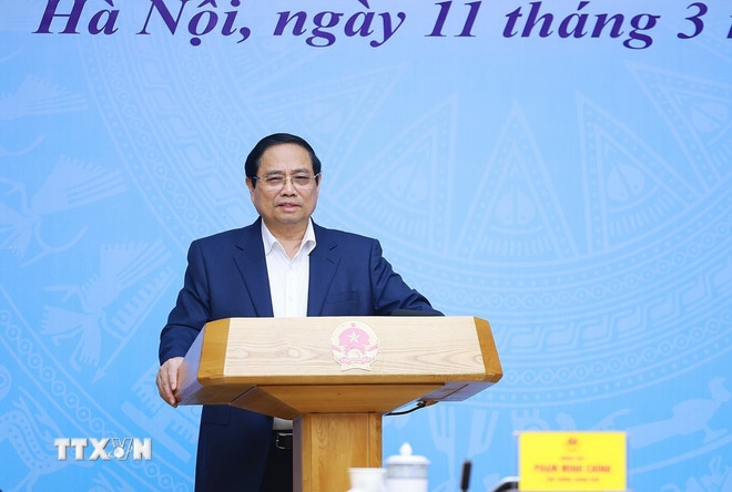 Thủ tướng Chính phủ Phạm Minh Chính chủ trì Hội nghị trực tuyến về phát triển ""kinh tế bạc" trên thế giới và thích ứng chính sách, chiến lược của Việt Nam. (Ảnh: Dương Giang/TTXVN)