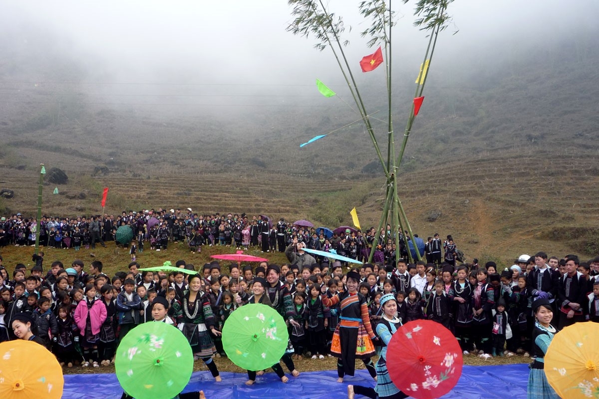 Locals and tourists participate in the Roong Pooc festival
