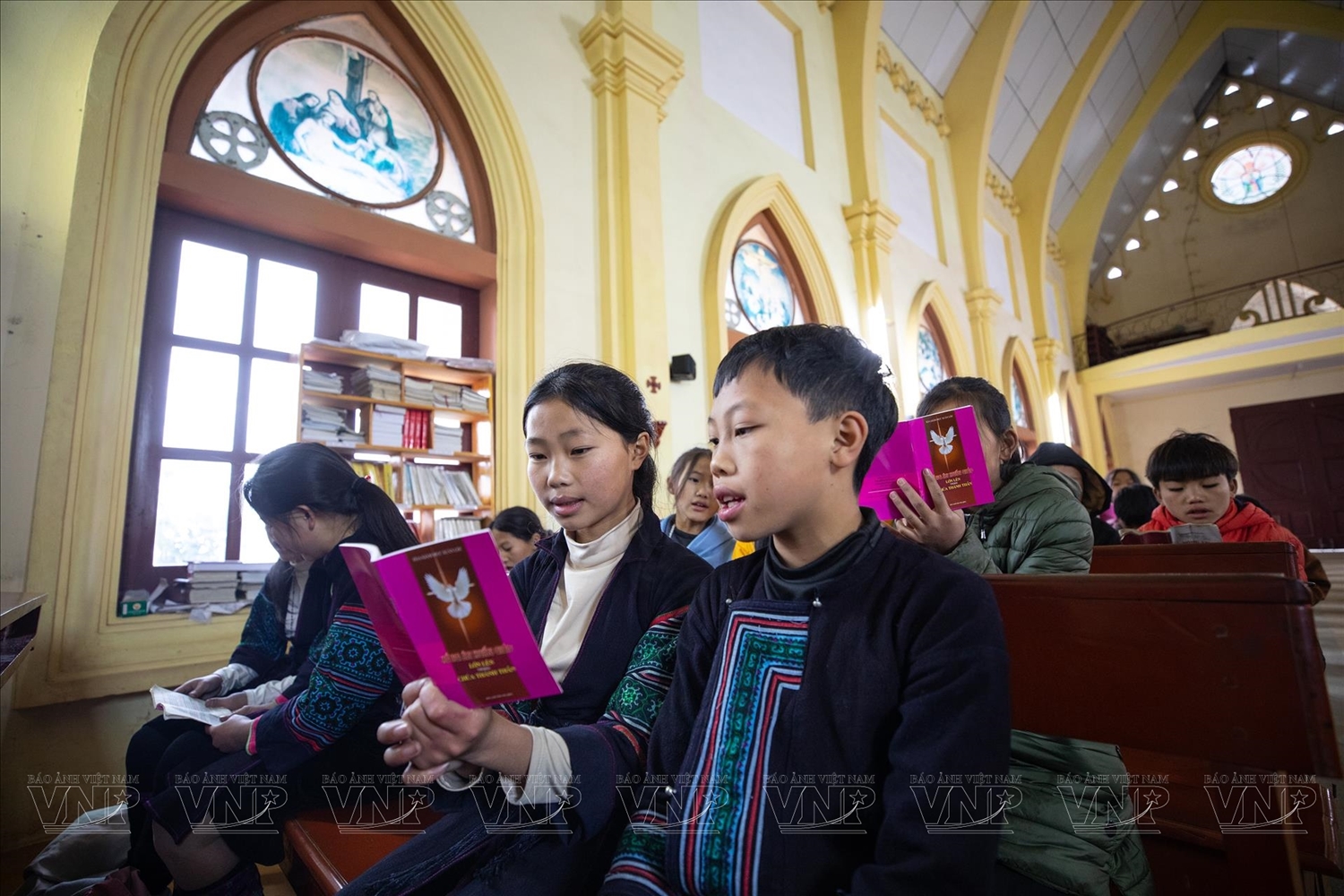Parishioners perform religious services at Hau Thao parish church in Lao Cai province