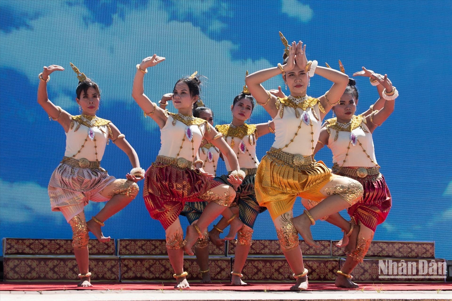Graceful Khmer young women performing the Romvong dance