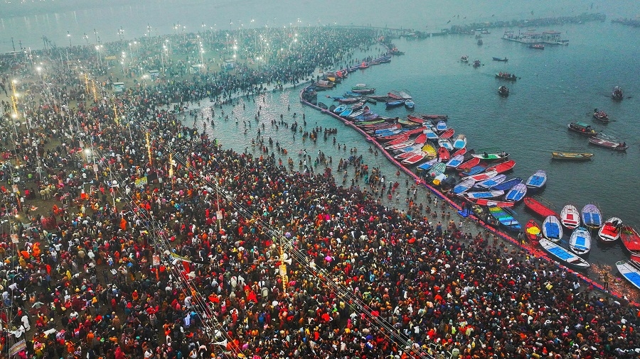 Hindu pilgrims are bathing in the sacred waters in Prayagraj, India